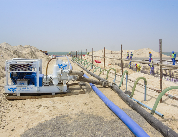 Heavy-duty industrial pipeline installation equipment at a construction site in Middle East, focusing on Wellpoint dewatering projects by WJ Middle East.